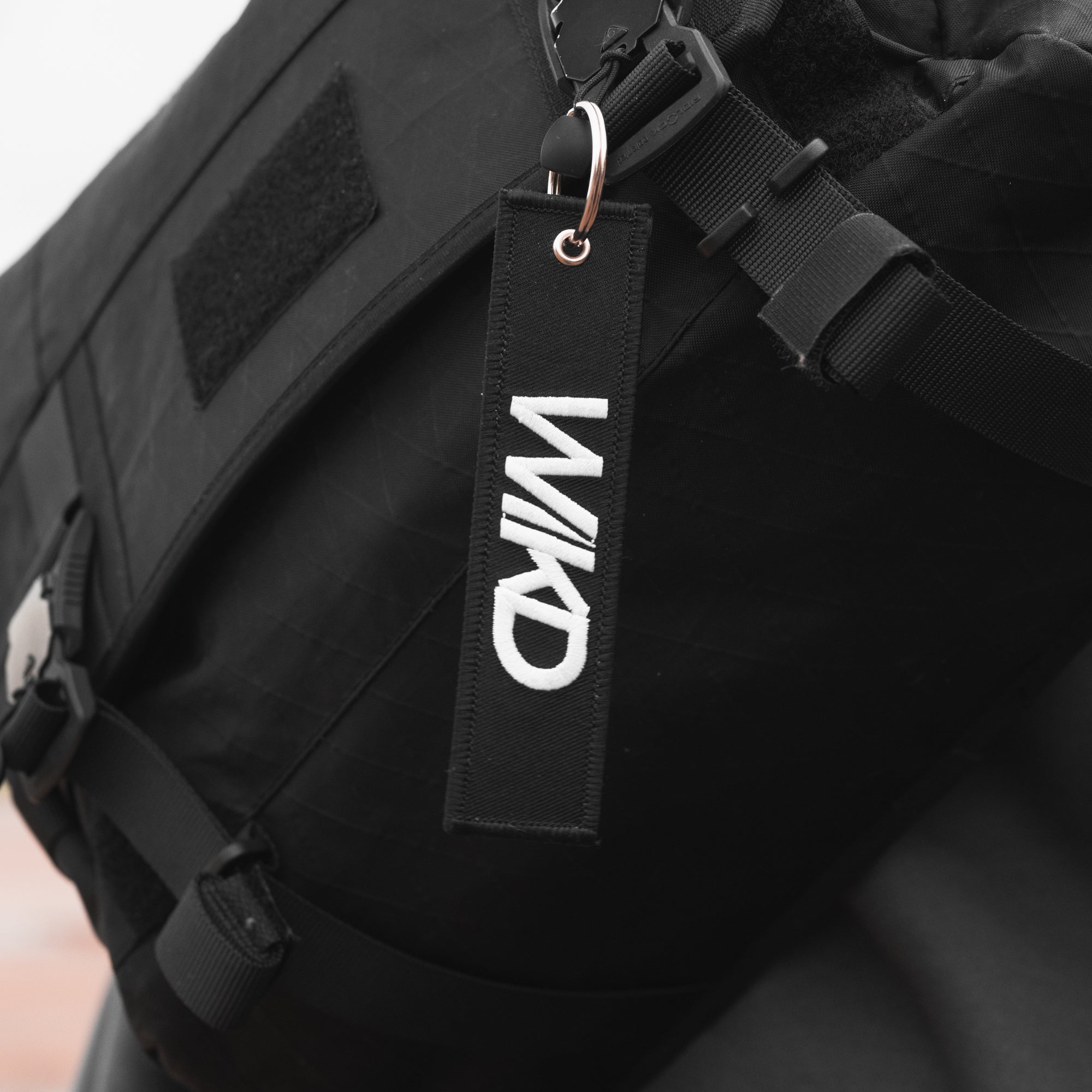 GET WIKD Jet Tag - WIKD on backpack on BOLT Motorsports